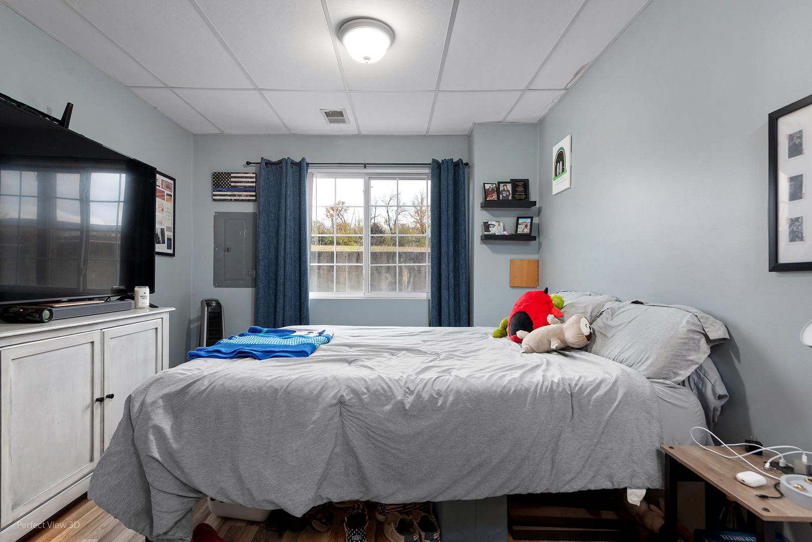 1310 Harvest Drive Crest Hill, IL 60403 - Photo 17 of 21 a bed room with a bed a television and a window