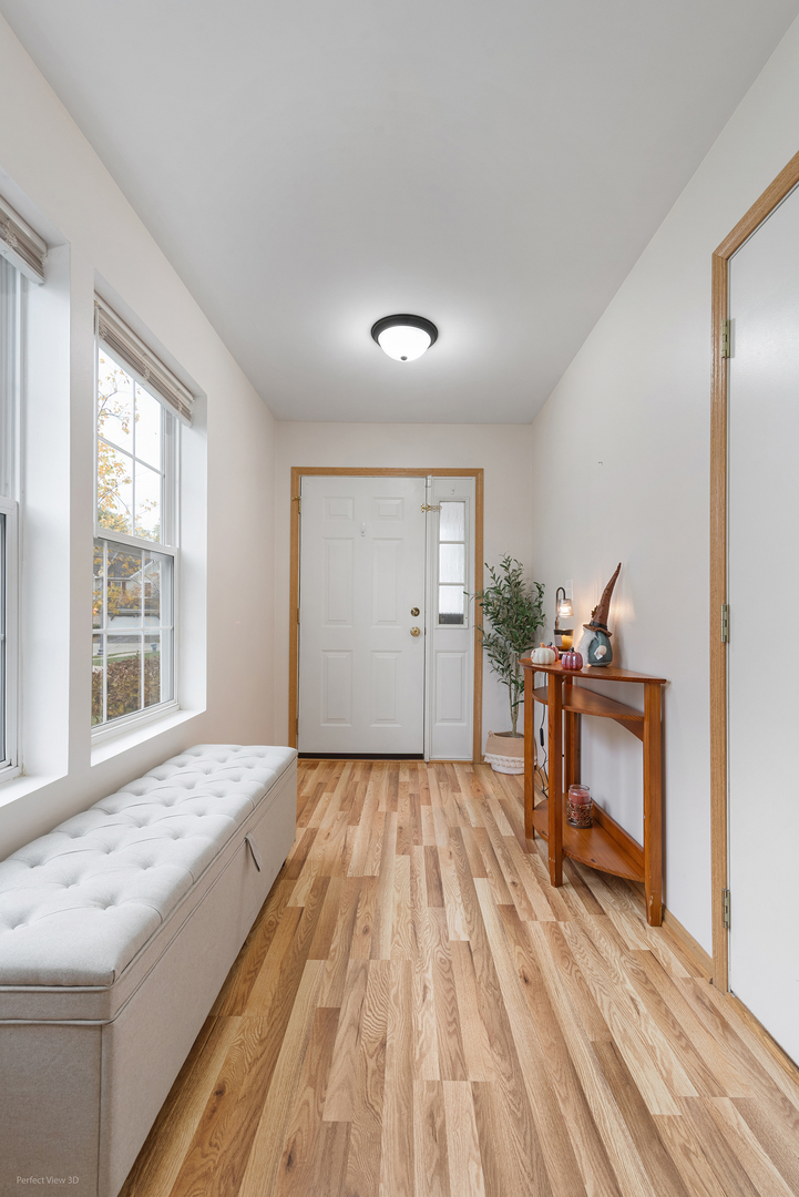 1310 Harvest Drive Crest Hill, IL 60403 - Photo 2 of 21 a bedroom with a bed and a window