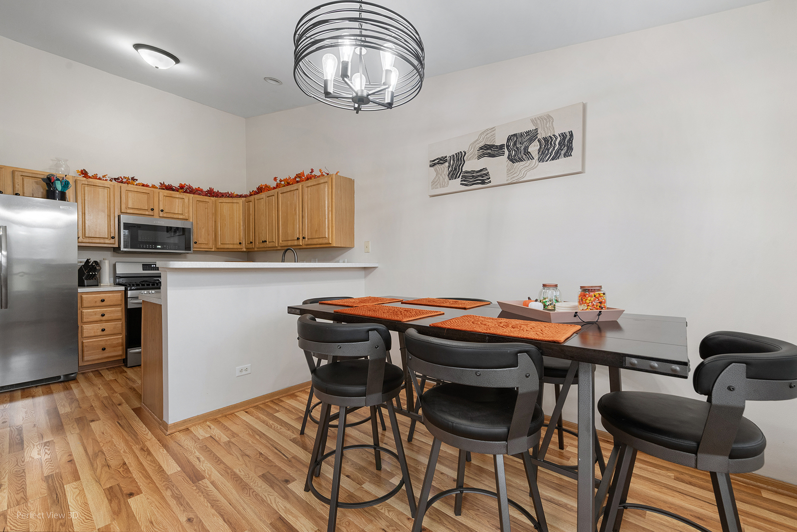 1310 Harvest Drive Crest Hill, IL 60403 - Photo 3 of 21 a table and chairs in a kitchen
