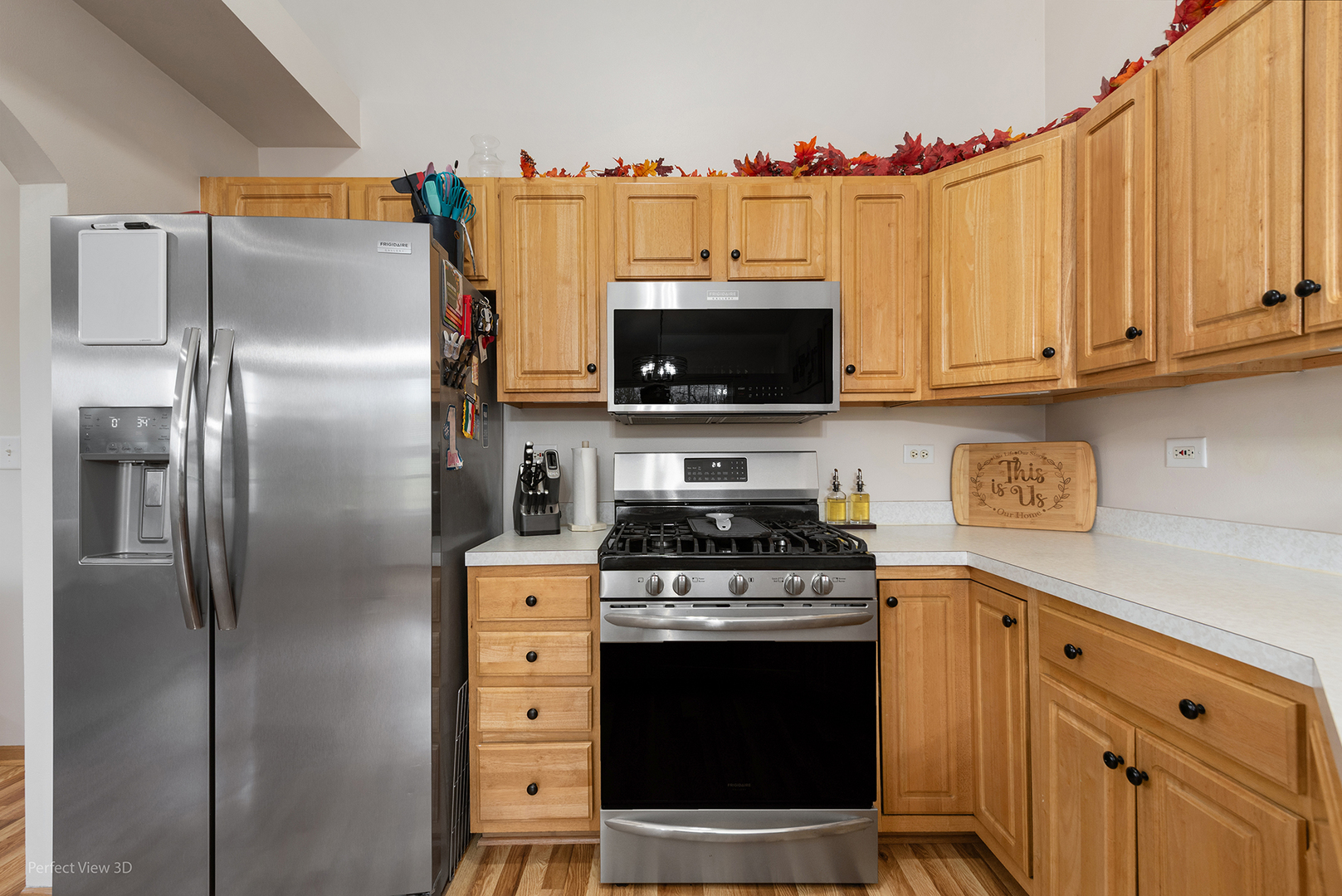 1310 Harvest Drive Crest Hill, IL 60403 - Photo 6 of 21 a kitchen with stainless steel appliances granite countertop a refrigerator stove and microwave