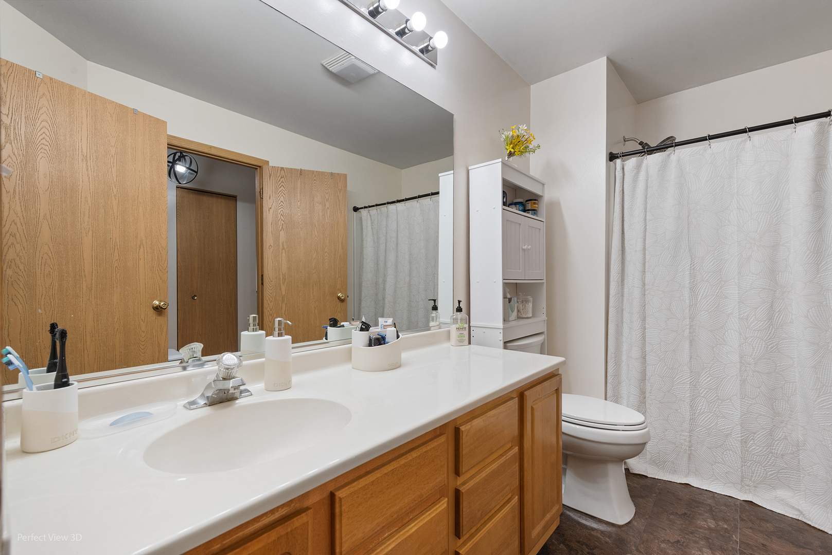 1310 Harvest Drive Crest Hill, IL 60403 - Photo 10 of 21 a bathroom with a double vanity sink and a mirror