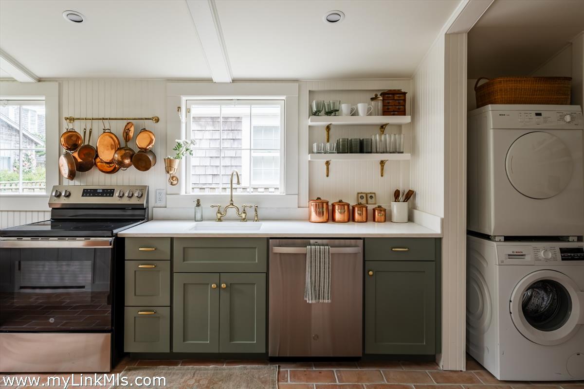 10 Centre Street Nantucket, MA 02554 - Photo 12 of 43 a kitchen with a stove and a sink