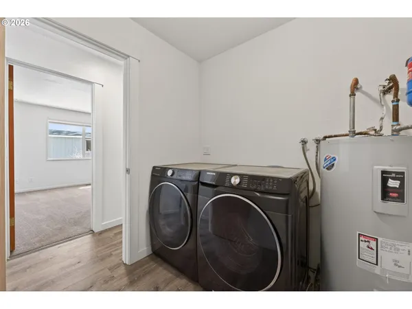 a utility room with dryer and washer