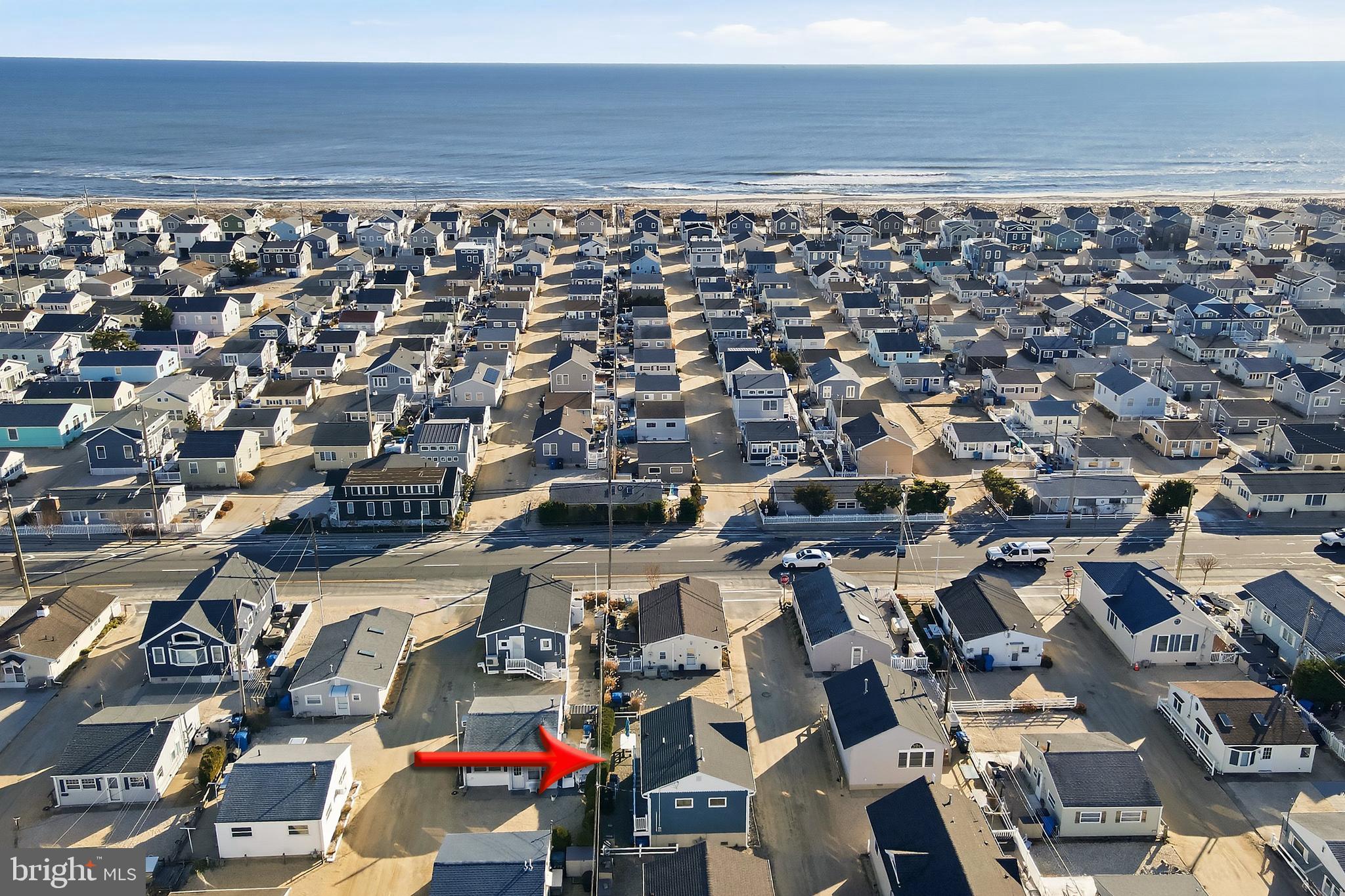 102 West Pompano Way Lavallette, NJ 08735 - Photo 2 of 28 an aerial view of a building with parking space
