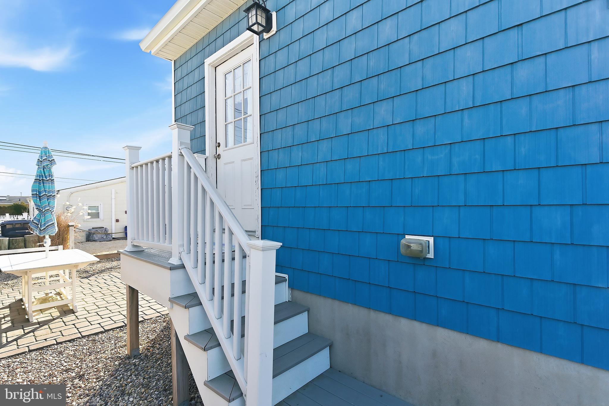 102 West Pompano Way Lavallette, NJ 08735 - Photo 4 of 28 a view of entryway with wooden floor