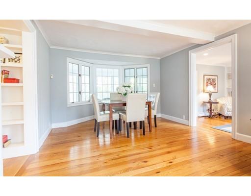 128 Revolutionary Road Concord, MA 01742 - Photo 3 of 20 a view of a dining room with furniture and wooden floor