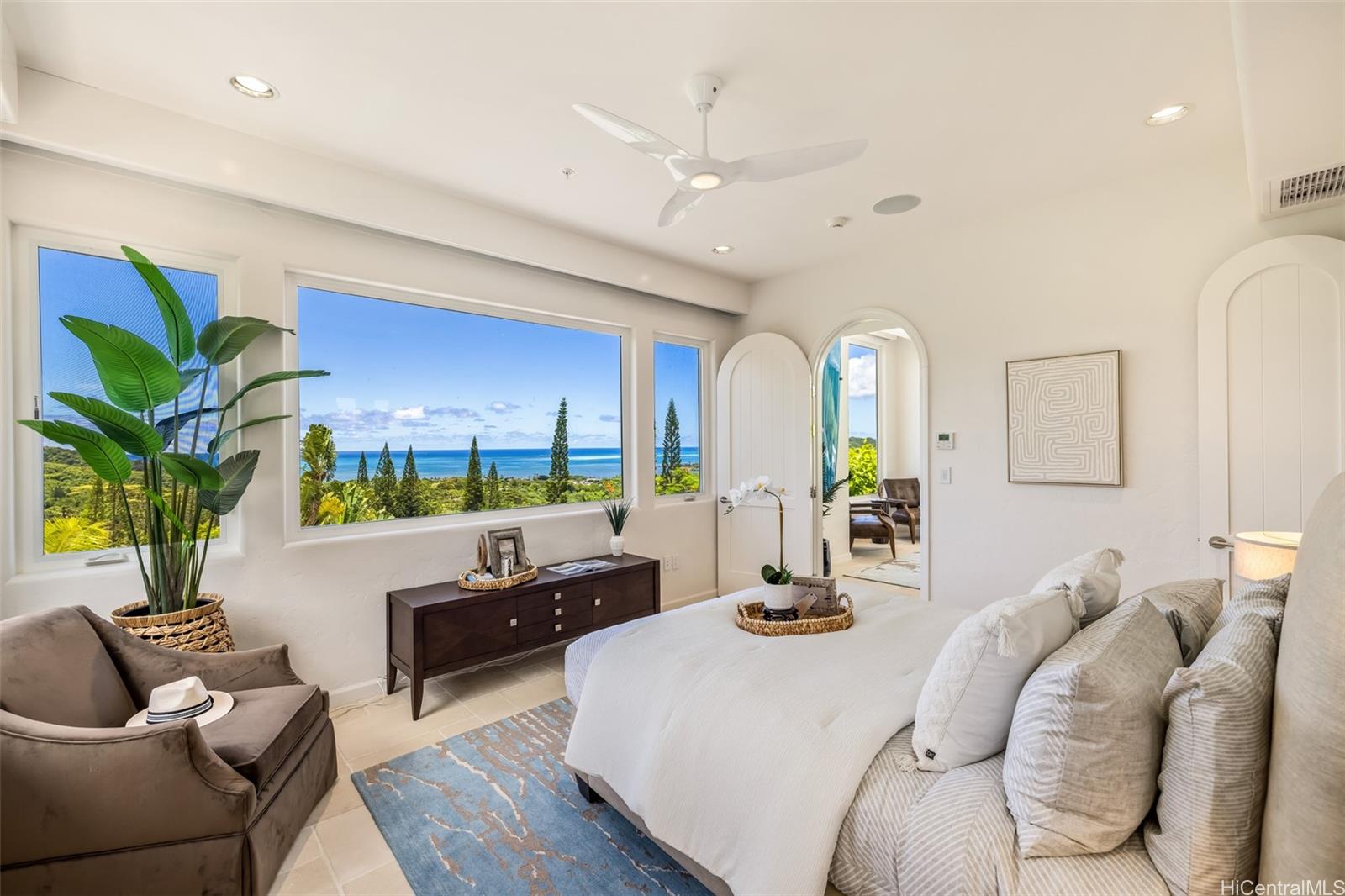 47-958 Kamakoi Road Kaneohe, HI 96744 - Photo 14 of 25 a living room with furniture kitchen view and large windows