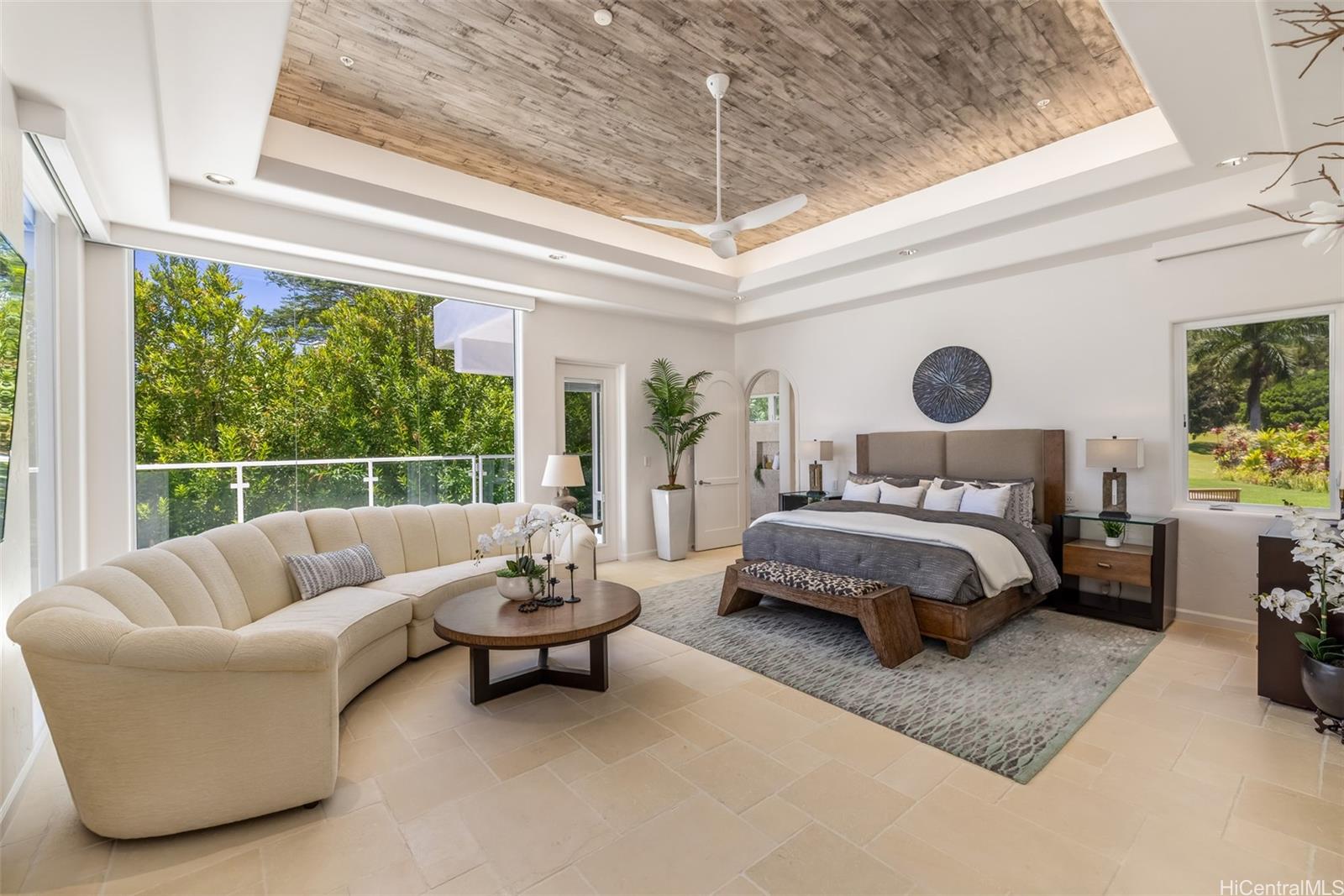 47-958 Kamakoi Road Kaneohe, HI 96744 - Photo 16 of 25 a bedroom with a bed and a couch