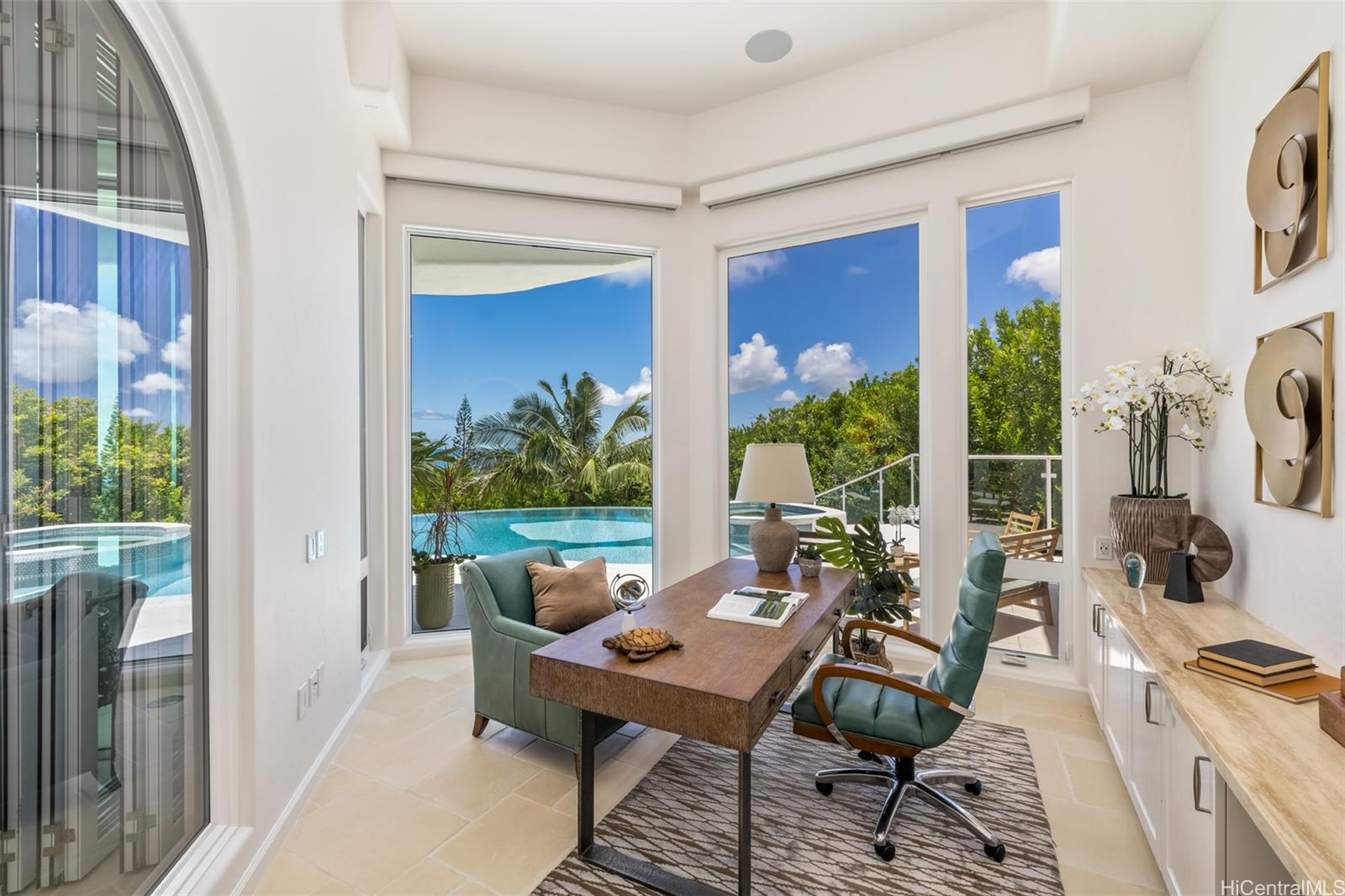 47-958 Kamakoi Road Kaneohe, HI 96744 - Photo 21 of 25 a view of a balcony with chairs and a potted plant