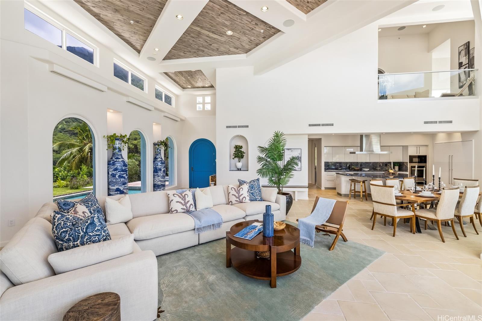 47-958 Kamakoi Road Kaneohe, HI 96744 - Photo 6 of 25 a living room with furniture potted plant kitchen view and a large window