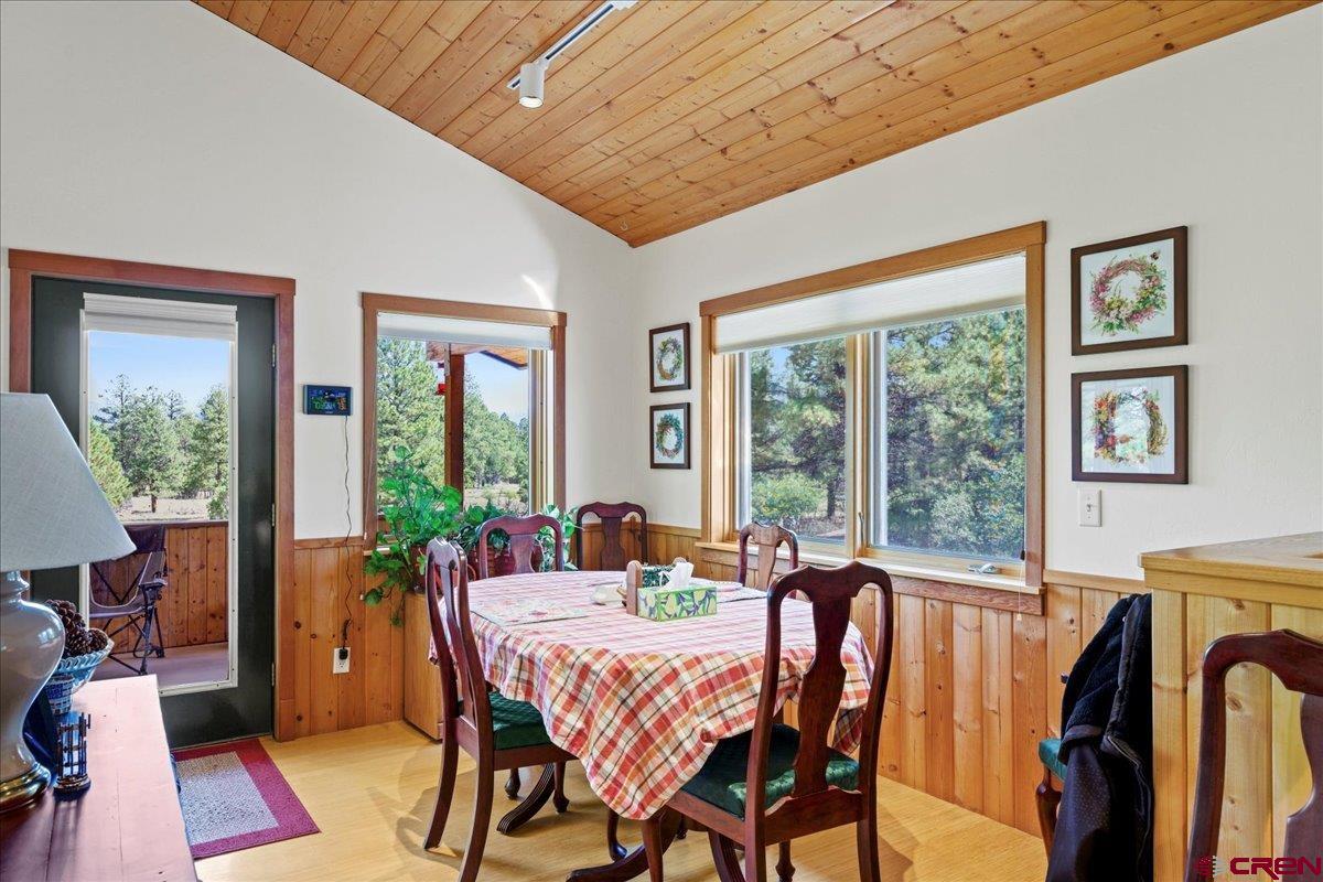 66 Blue Stem Ridgway, CO 81432 - Photo 4 of 19 a view of a dining room with furniture window and outside view