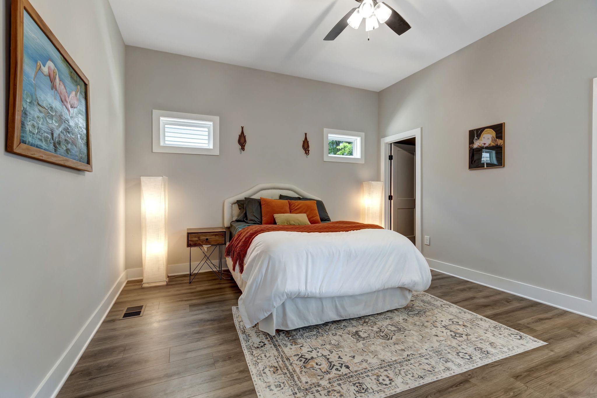 9 Decatur Street Nashville, TN 37210 - Photo 14 of 31 a bedroom with a bed and wooden floor