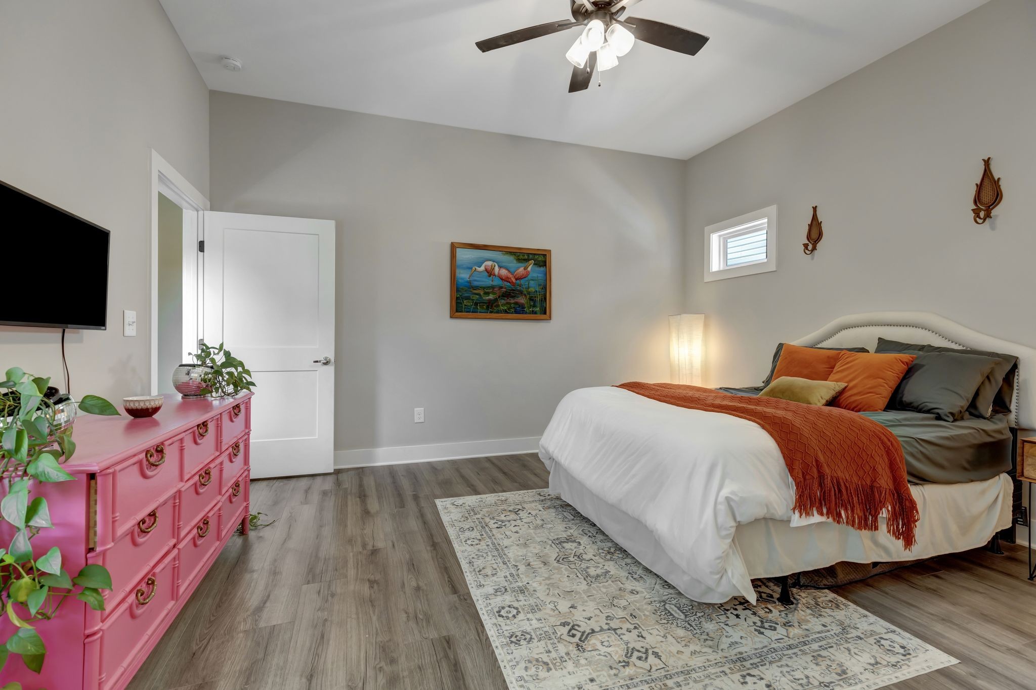 9 Decatur Street Nashville, TN 37210 - Photo 16 of 31 a bedroom with a bed and a flat screen tv