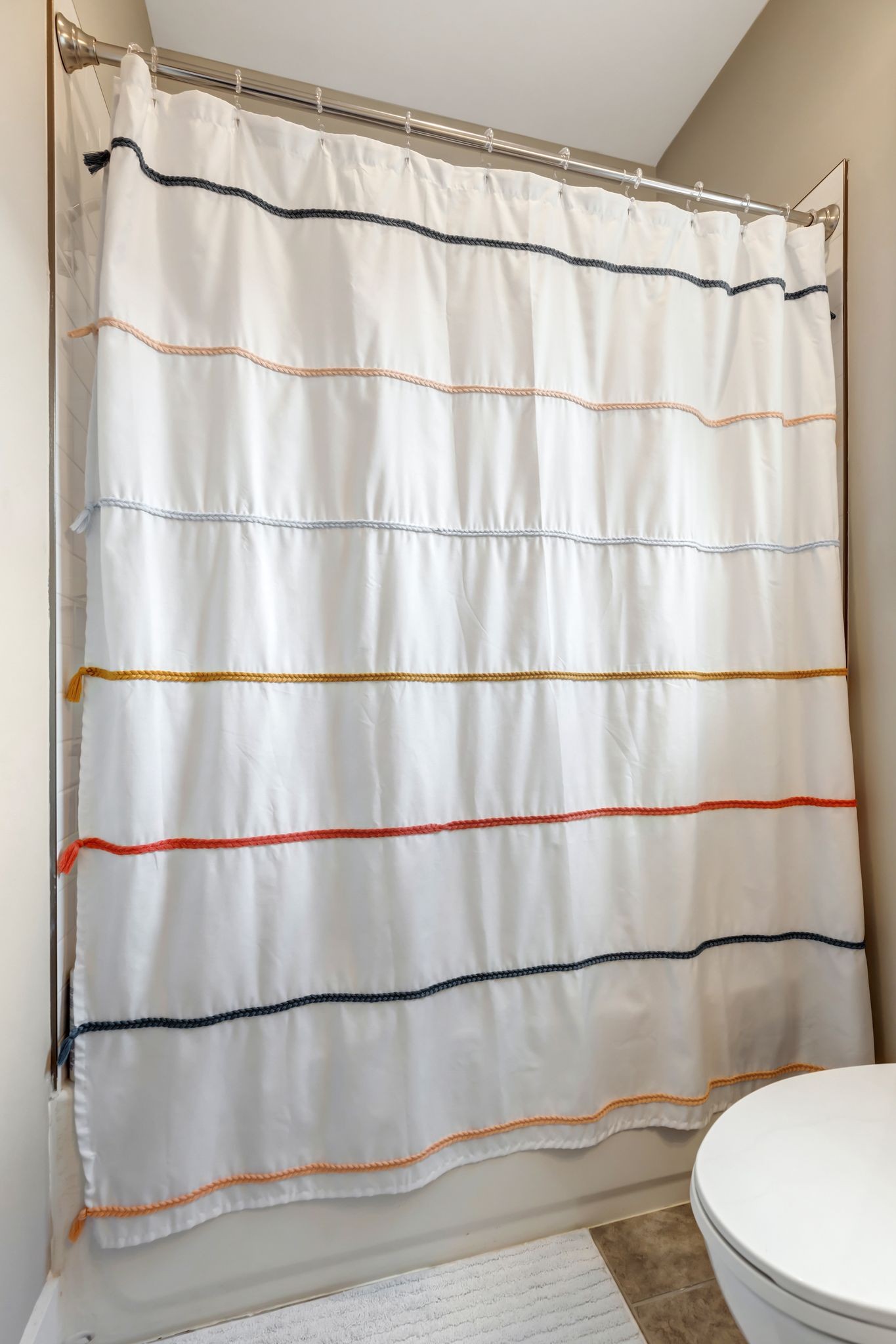 9 Decatur Street Nashville, TN 37210 - Photo 22 of 31 a bathroom with a toilet and a shower curtain