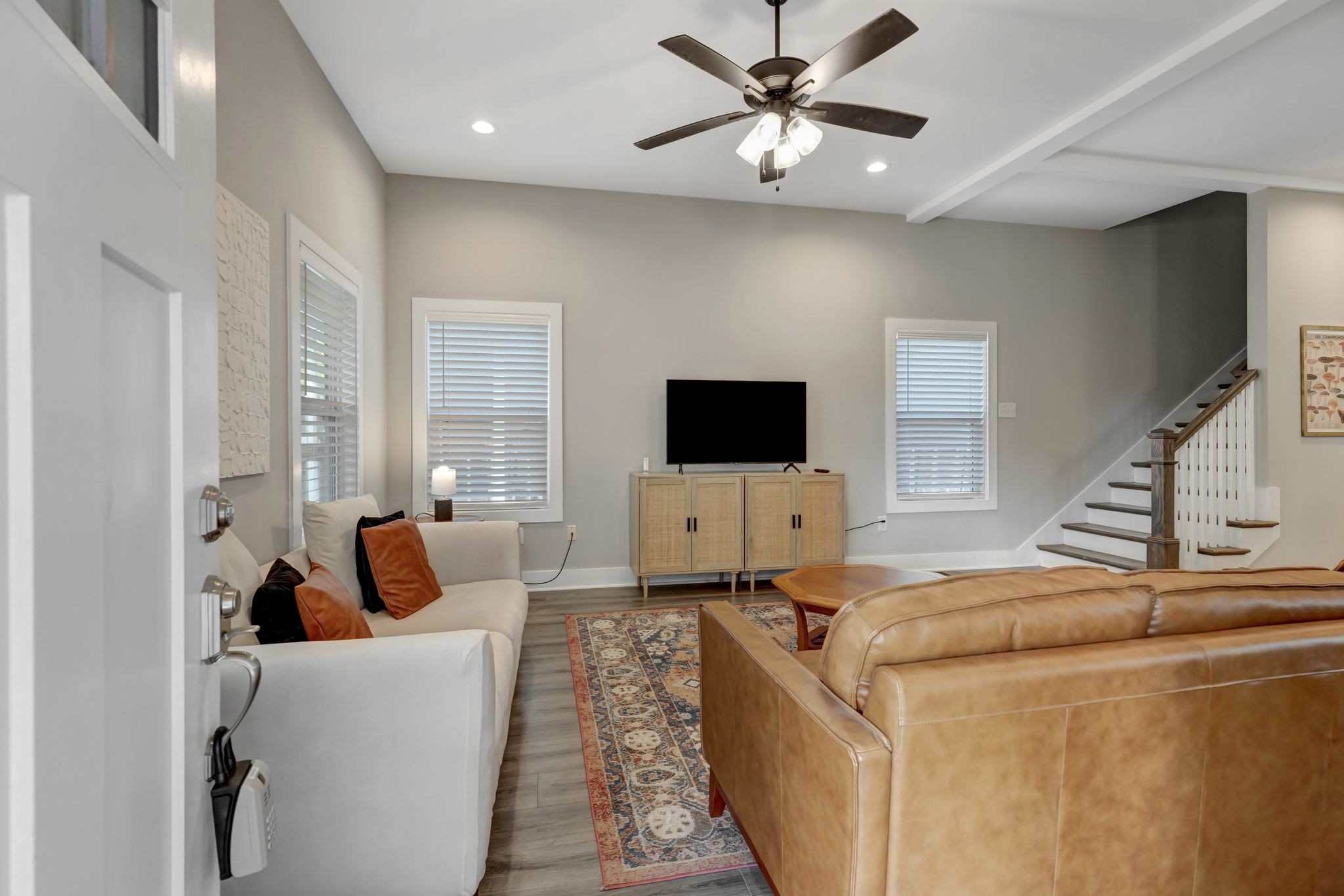9 Decatur Street Nashville, TN 37210 - Photo 5 of 31 a living room with furniture and a flat screen tv