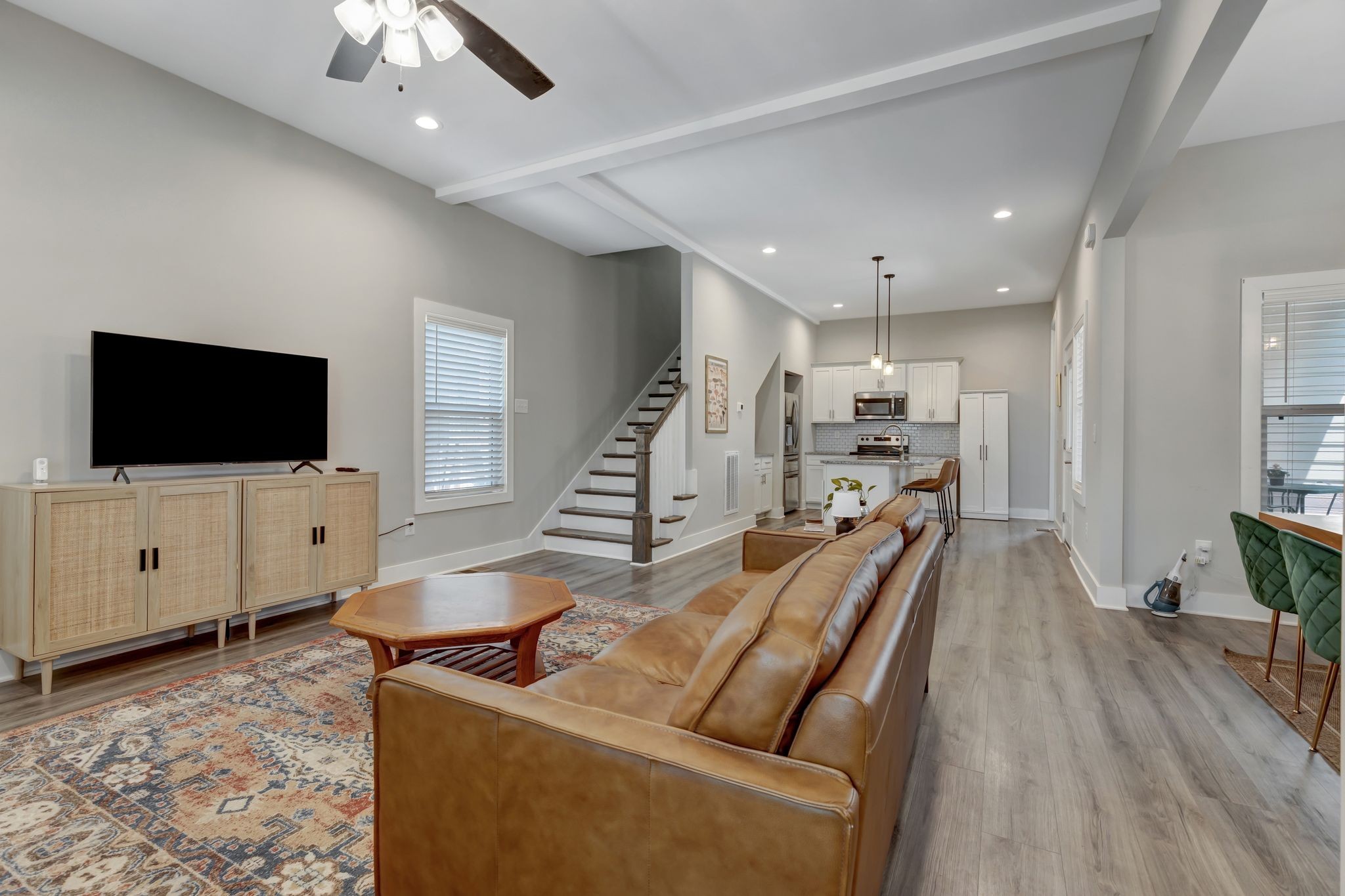 9 Decatur Street Nashville, TN 37210 - Photo 6 of 31 a view of a livingroom with furniture and a flat screen tv