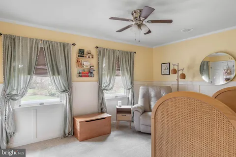 a view of a room with a fan