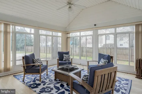 a view of a patio with swimming pool