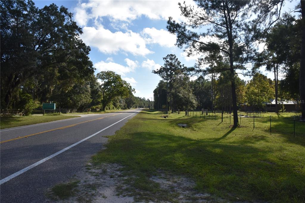 225 Off Highway Gainesville, FL 32609 - Photo 5 of 34 a view of a playground with basketball court