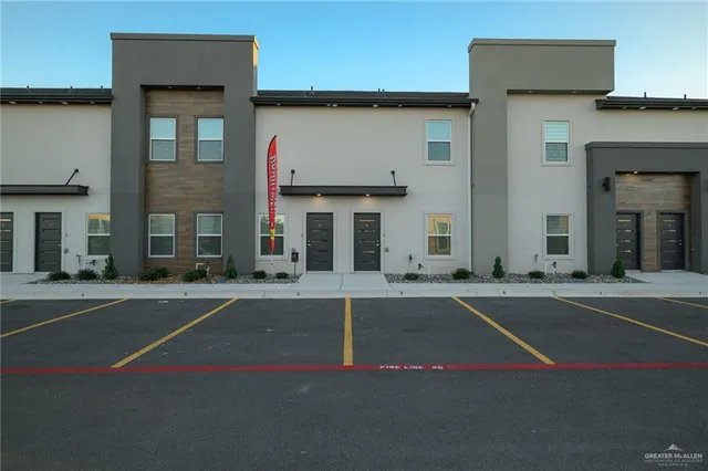 a view of a building with a street