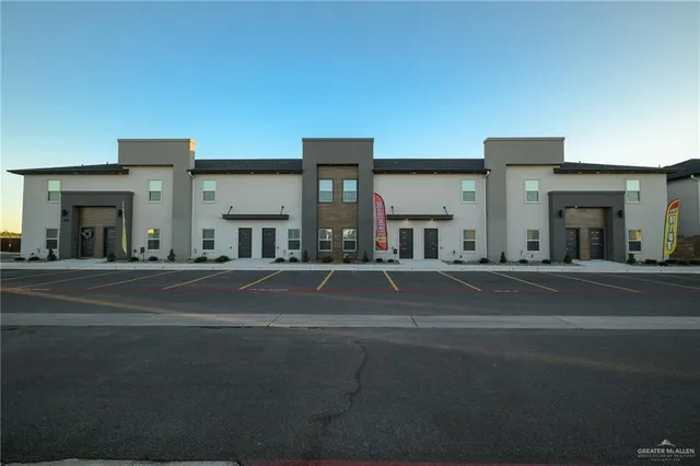 a view of a building with a street