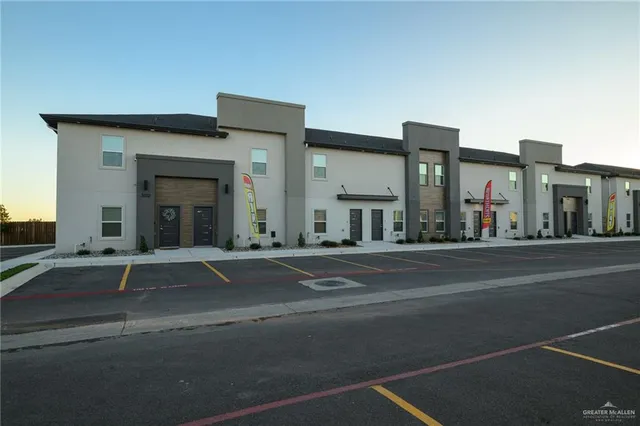 a view of a building along the street