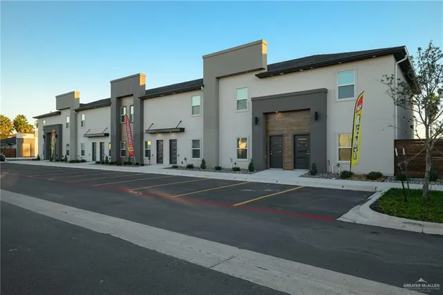 a view of a building along the street
