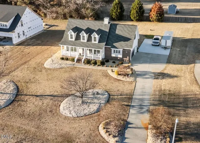 a picture of a bathroom with a sink and mirror