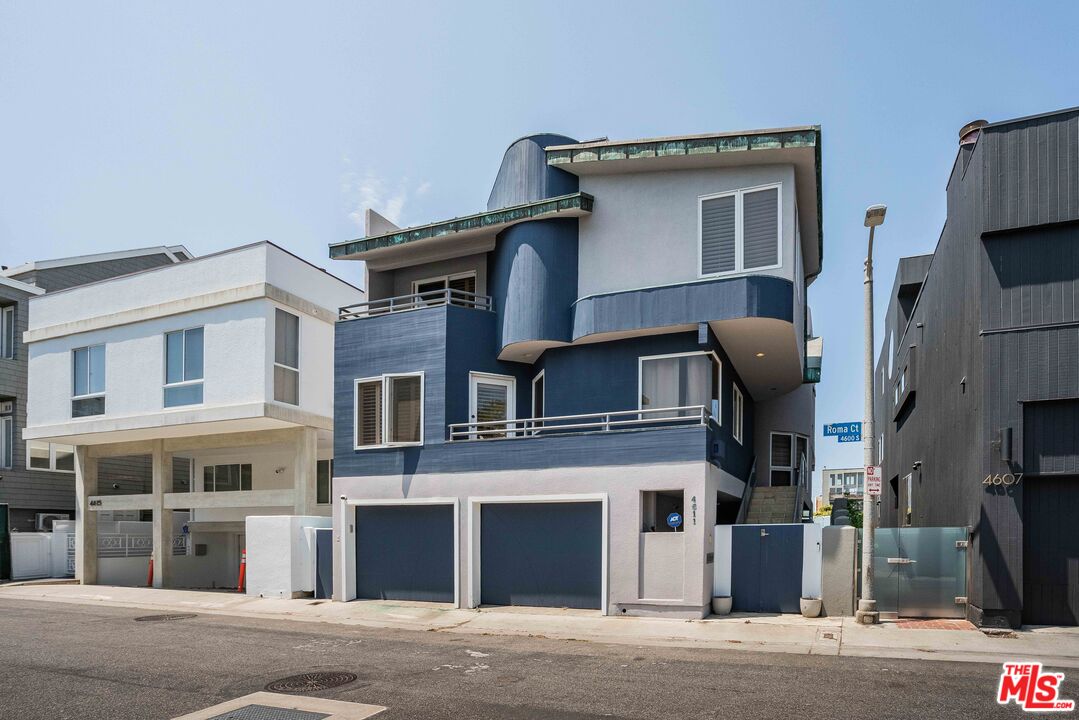 a front view of a house with a garage