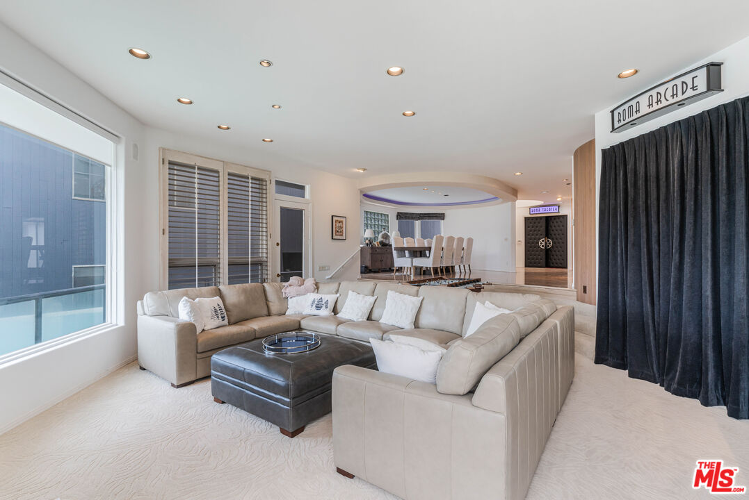 4611 Roma Court Marina del Rey, CA 90292 - Photo 18 of 46 a living room with furniture and a large window
