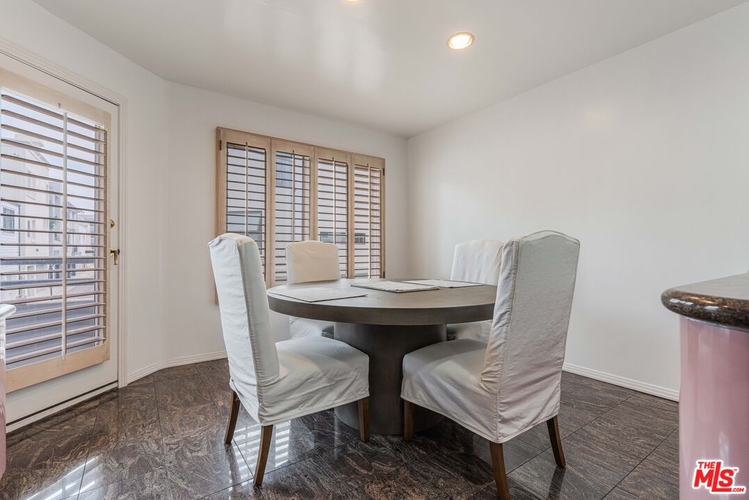 4611 Roma Court Marina del Rey, CA 90292 - Photo 26 of 46 a view of a dining room with furniture window and wooden floor