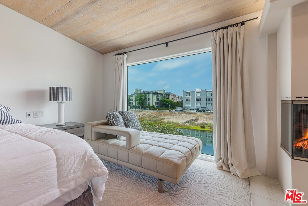 4611 Roma Court Marina del Rey, CA 90292 - Photo 31 of 46 a living room with couch and a large window