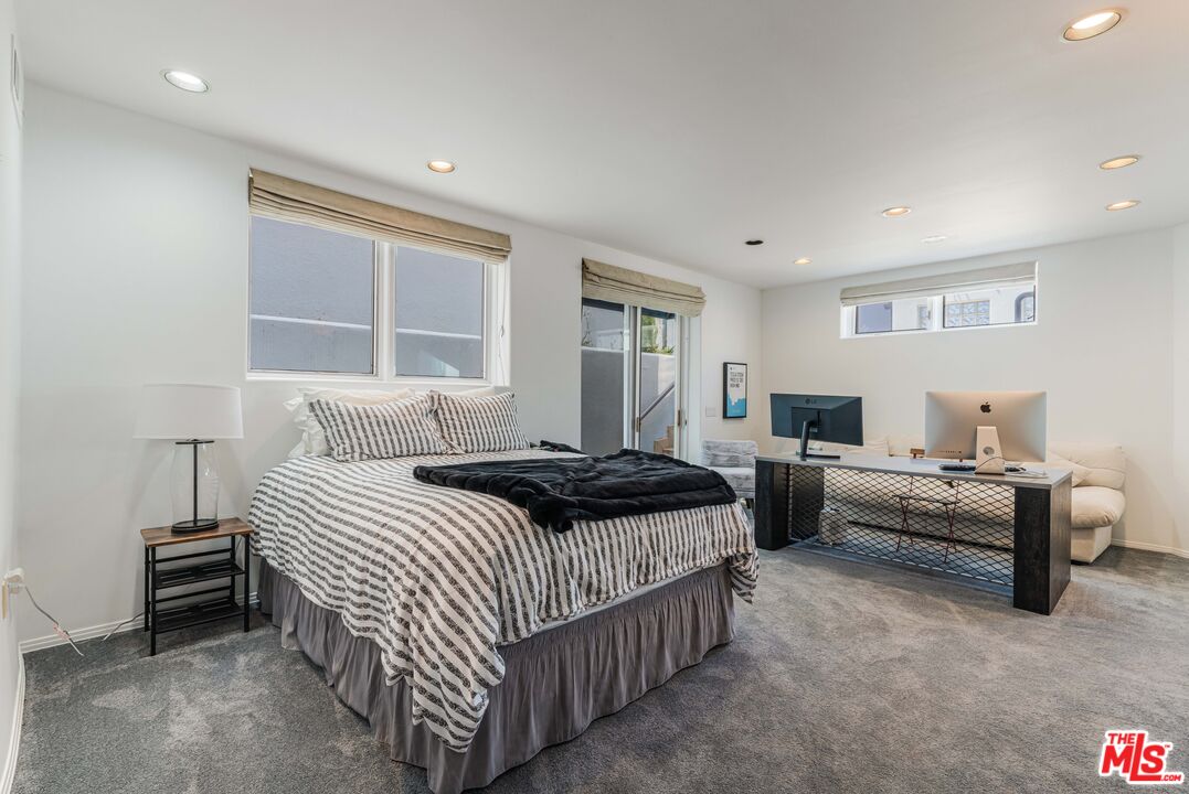 4611 Roma Court Marina del Rey, CA 90292 - Photo 41 of 46 a bedroom with bed and a large window