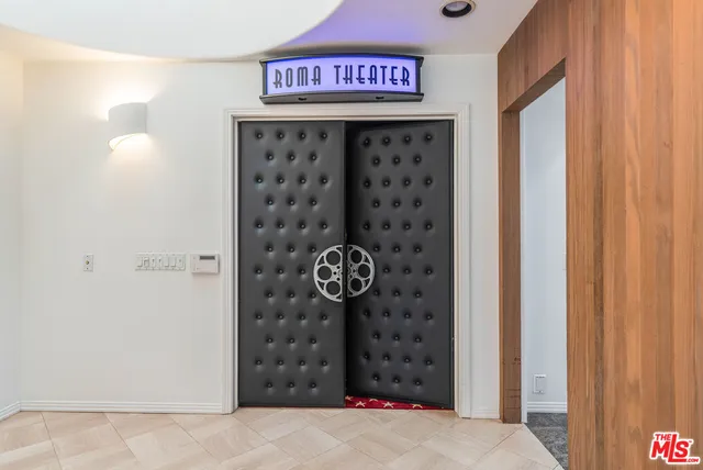 a utility room with sink dryer and washer