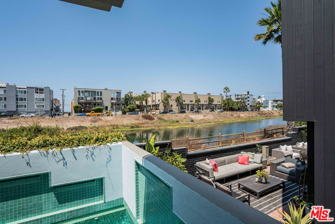 4611 Roma Court Marina del Rey, CA 90292 - Photo 7 of 46 a view of a lake with couches and city view