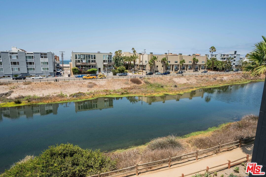 4611 Roma Court Marina del Rey, CA 90292 - Photo 8 of 46 a view of a lake with tall buildings