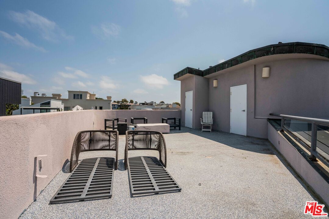 4611 Roma Court Marina del Rey, CA 90292 - Photo 9 of 46 a dining room with furniture and a rug