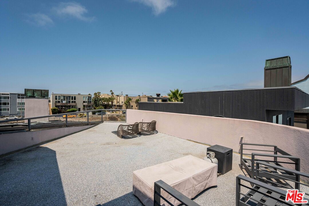 4611 Roma Court Marina del Rey, CA 90292 - Photo 10 of 46 a kitchen with a table and chairs