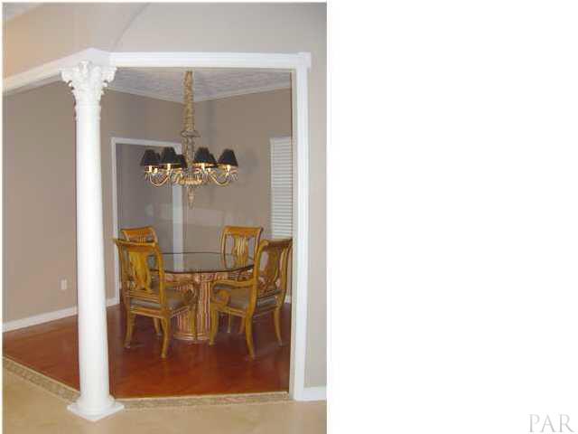 2513 Rosedown Drive Cantonment, FL 32533 - Photo 4 of 13 Diningroom - hardwood floors with marble mosaic border.