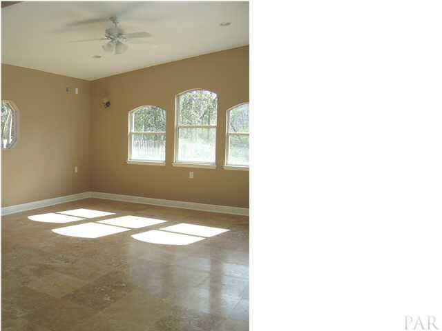 2513 Rosedown Drive Cantonment, FL 32533 - Photo 6 of 13 Gameroom - limestone floors, vaulted ceiling.