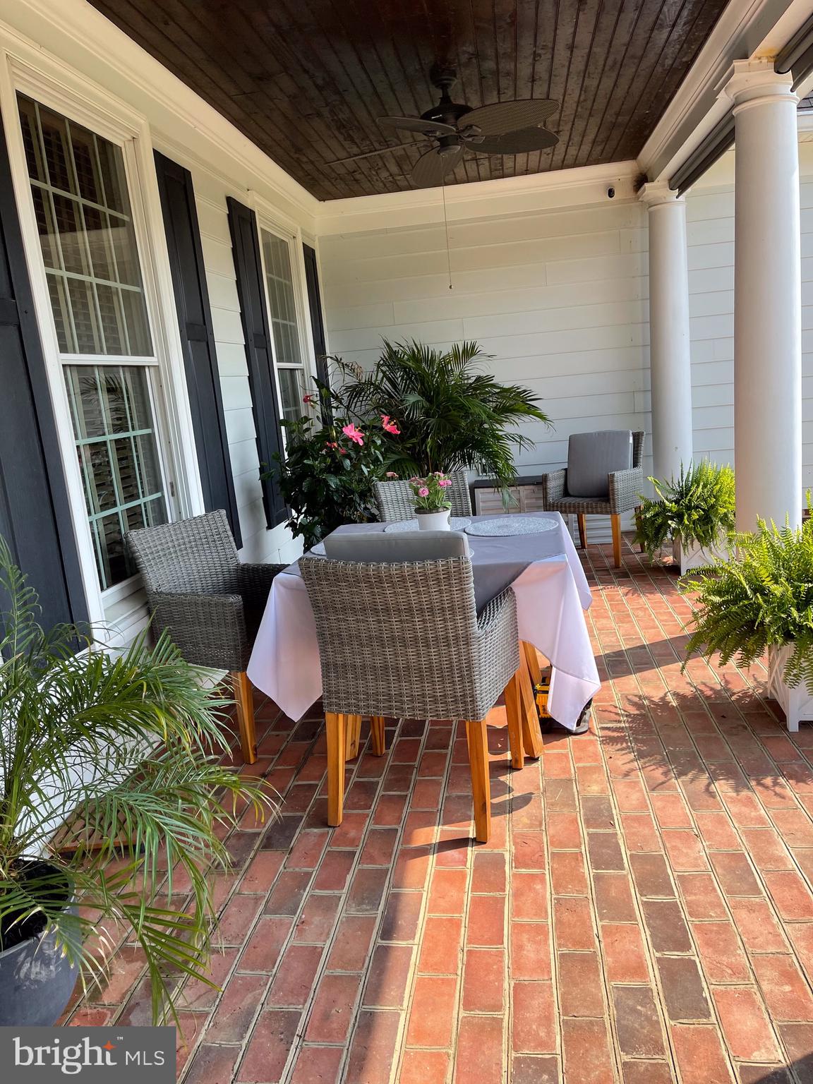 4611 Fawn Grove Road Pylesville, MD 21132 - Photo 84 of 86 Summer photo of front porch dining