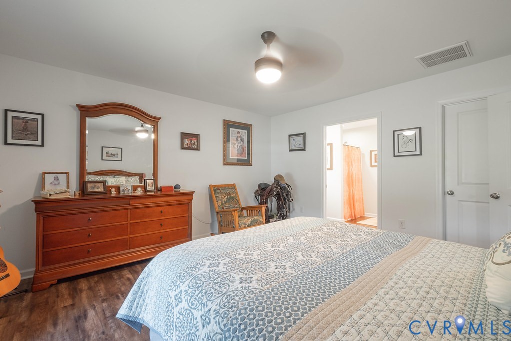 4336 Hells Bend Road Palmyra, VA 22963 - Photo 13 of 35 Neutral white walls complement wood-finish floorin