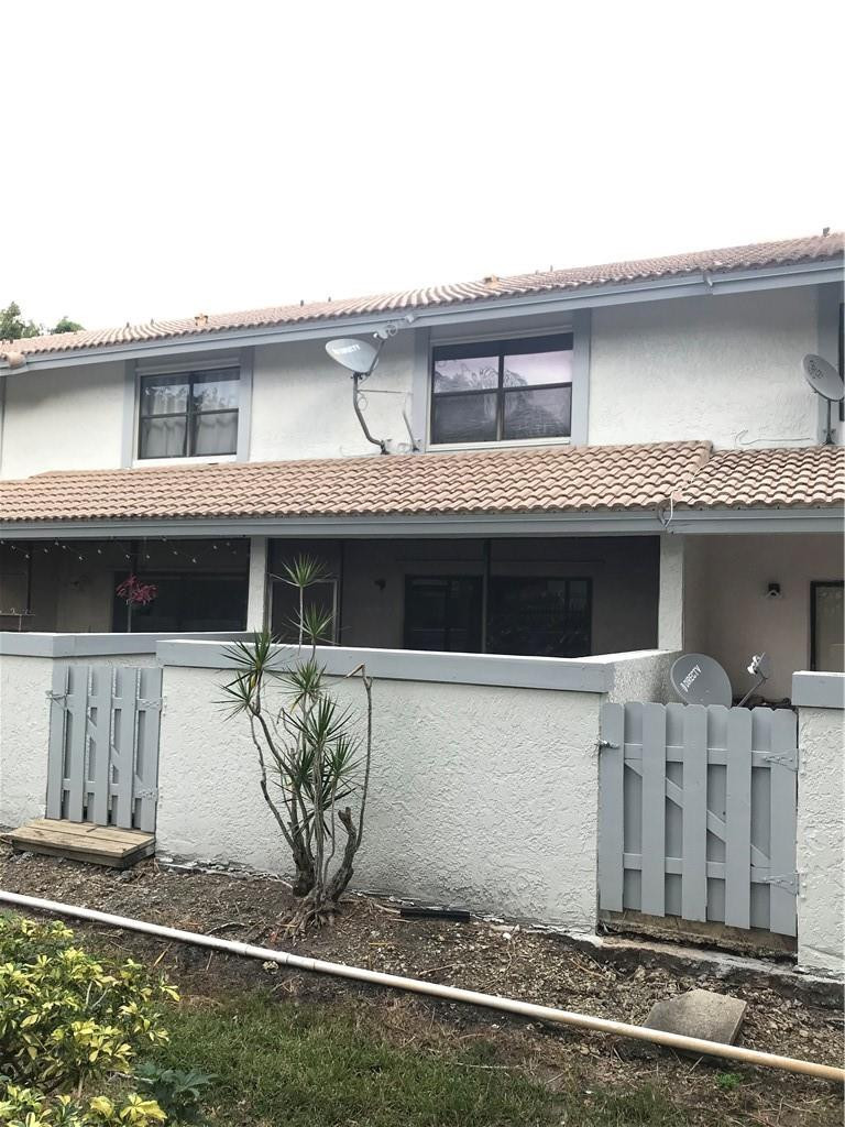9781 Riverside Drive, Unit 653 Coral Springs, FL 33071 - Photo 18 of 19 a front view of a house