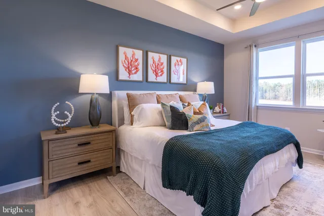 a bed room with a bed and a window