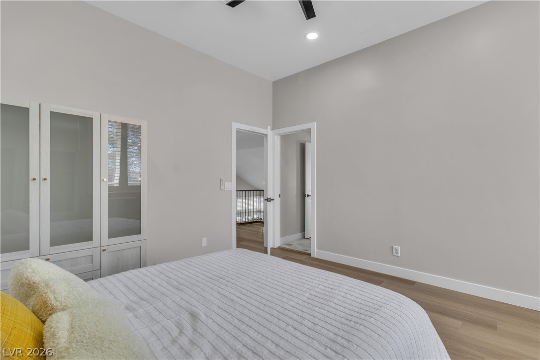 8848 Rainbow Ridge Drive Las Vegas, NV 89117 - Photo 24 of 43 Tall ceilings and abundant natural light create an open, airy feel in this comfortable bedroom.