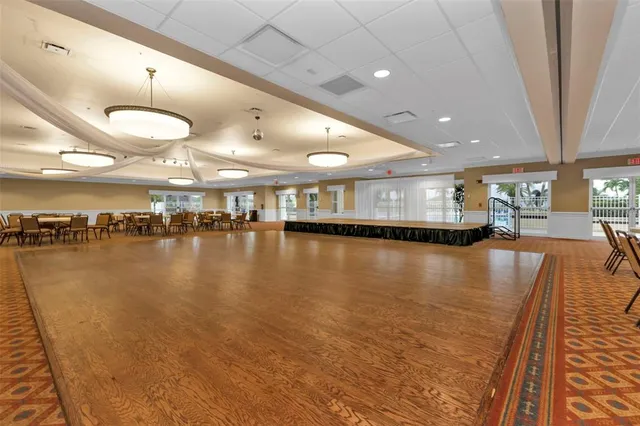 a room with gym equipment and mirrors