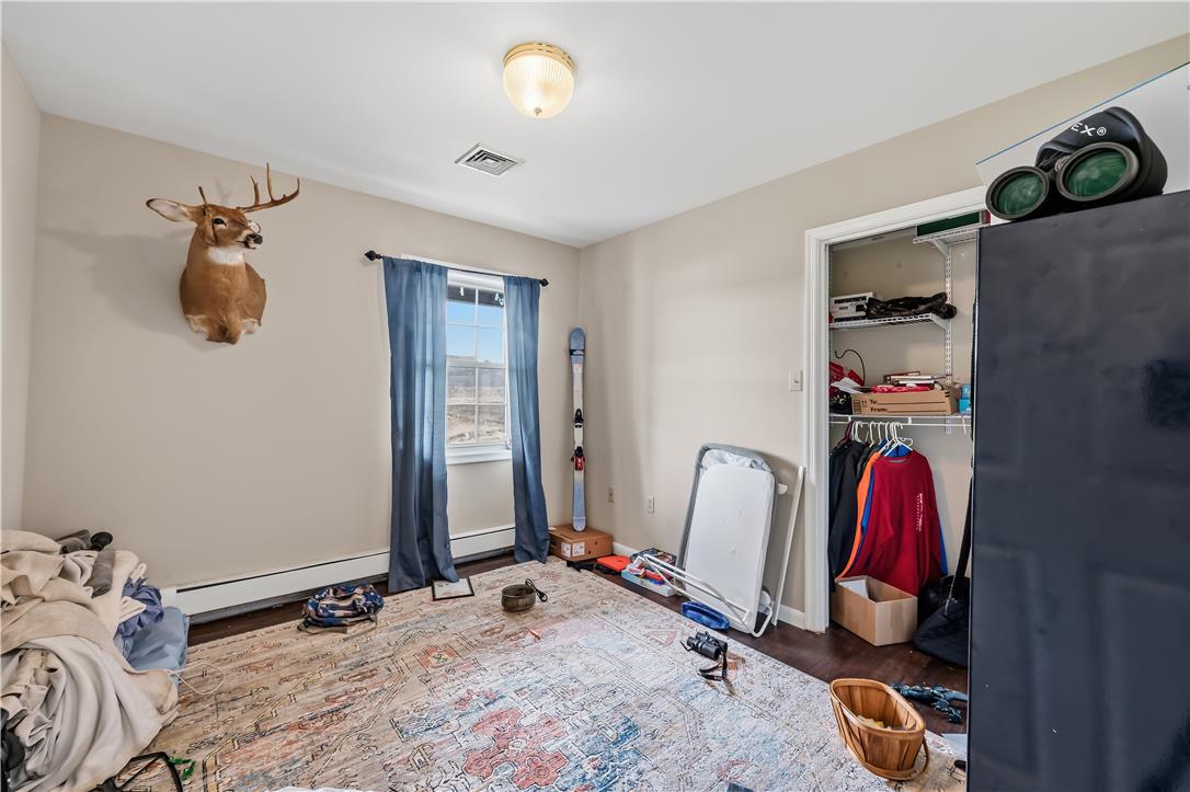 9868 Stagecoach Road Kempton, PA 19529 - Photo 13 of 17 A quiet retreat, this bedroom offers ample space and hardwood flooring.