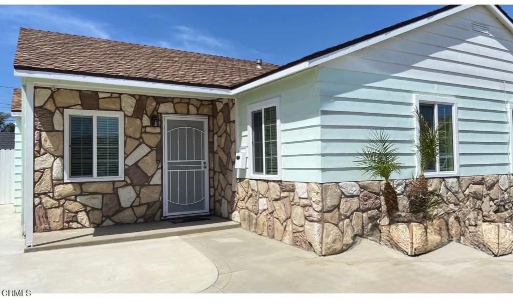 1239 South K Street Oxnard, CA 93033 - Photo 1 of 1 a view of a door and a window