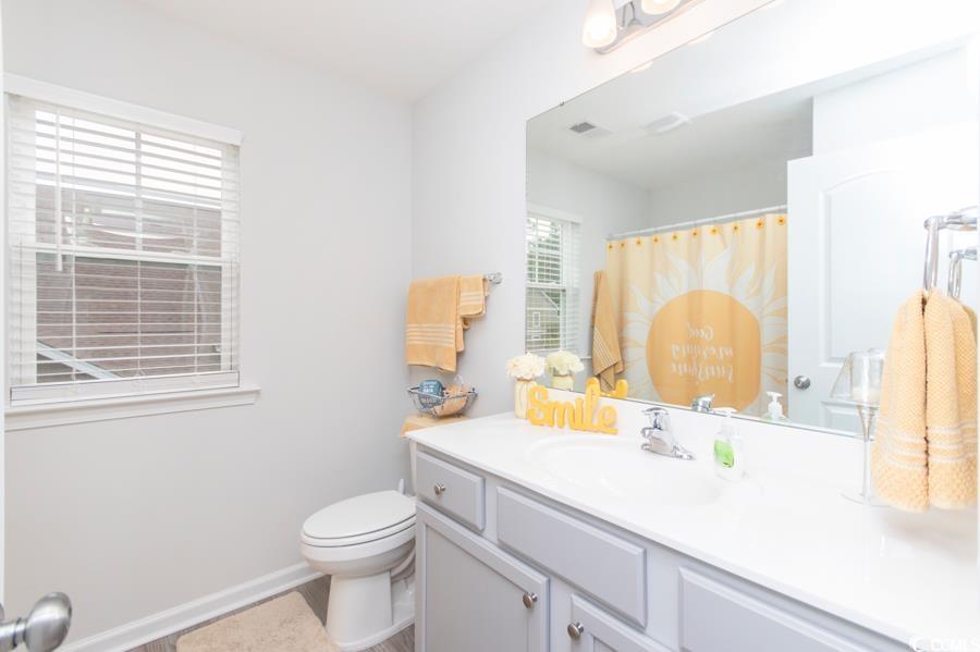131 Machrie Loop, Unit A Myrtle Beach, SC 29588 - Photo 29 of 40 Bathroom featuring vanity and toilet