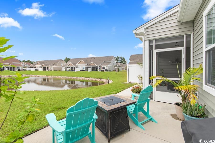 131 Machrie Loop, Unit A Myrtle Beach, SC 29588 - Photo 35 of 40 View of patio with a water view